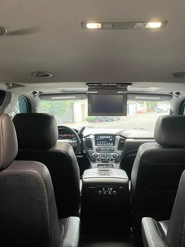 Chevrolet interior with black seats and a fold-down ceiling screen